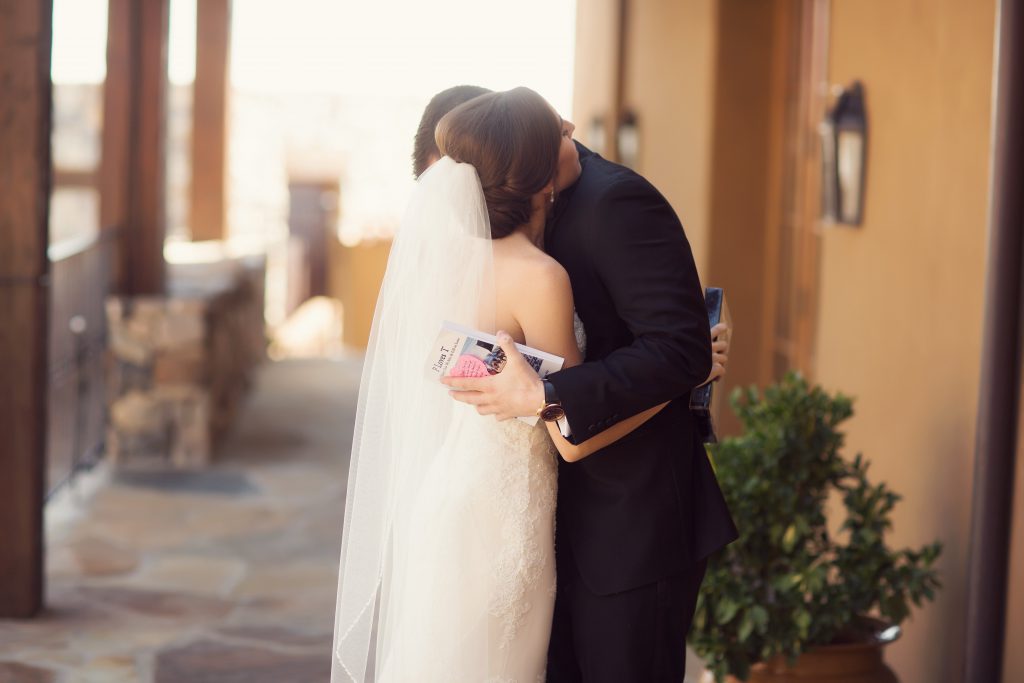 Bride and groom hugging during their wedding day