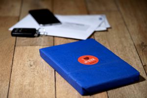 Electric blue paper-wrapped book