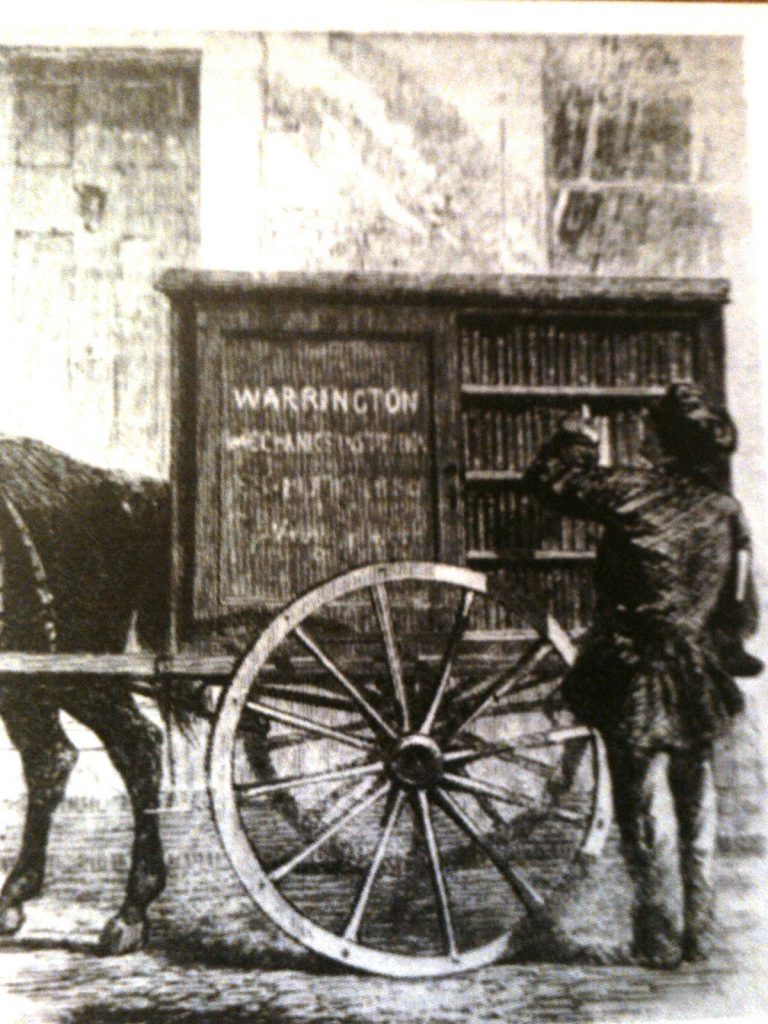 An old bookmobile pulled by a horse 